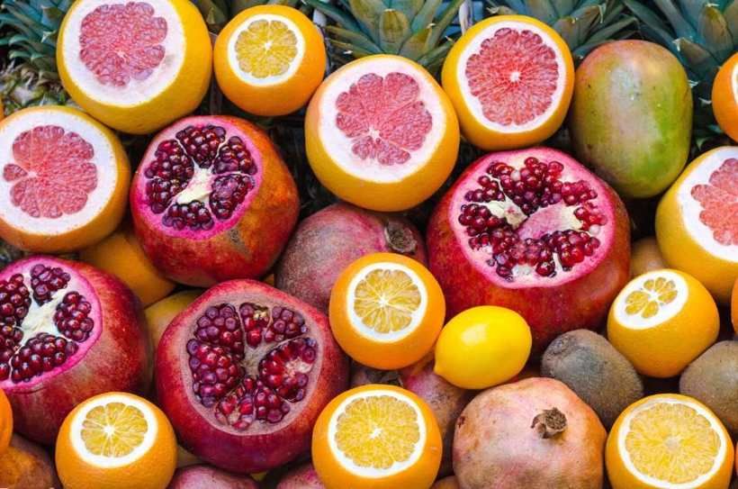 Oranges and citrus cut in half
