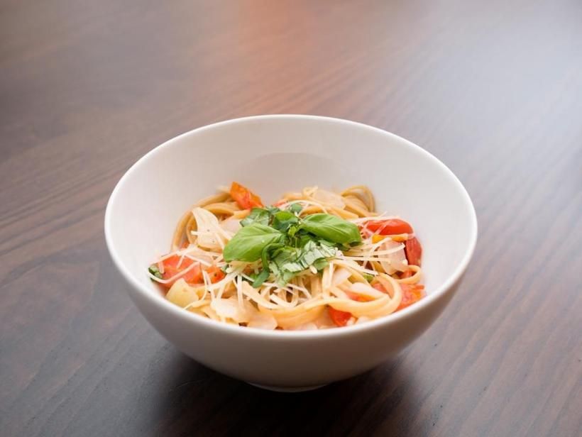Pasta with cherry tomatoes in a bowl