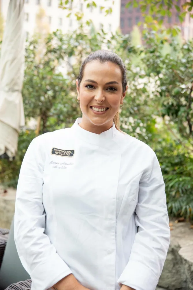 Ritratto di Maria Amalia Anedda in divisa da chef
